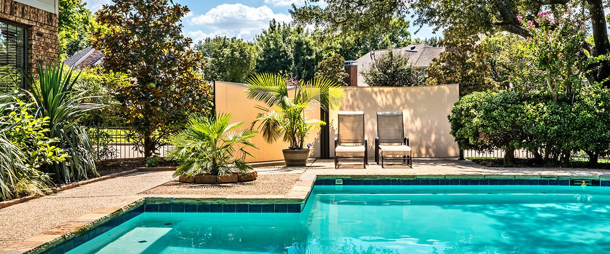 Private backyard with pool.