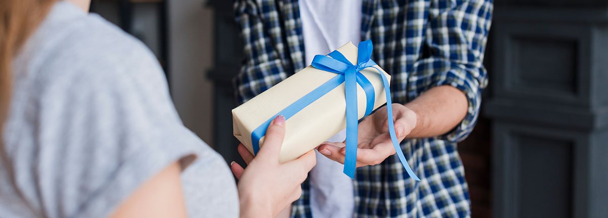 giving a gift to the host